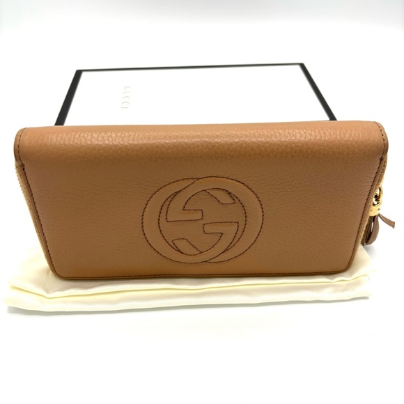 Gucci Handbags - Gucci Tan Leather Zip Around Wallet